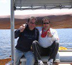 ASA certified sailboat instructor providing hands-on sailing training and instruction.